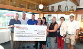 Family of the late Harvey Friesen and Perimeter Aviation (Bearskin Airlines) representatives present SLMHC Foundation representatives with a cheque for nearly $50,000, which was raised at this year’s charity golf tournament.  From left: Foundation preside