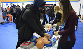 Students had the opportunity to ‘save a life’ at the Sioux Lookout Meno Ya Win Health Centre booth during the career fair. - Jesse Bonello / Bulletin Photo