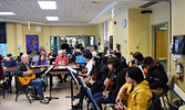 Grade 10 Pelican Falls First Nations High School students provided Extended Care residents, and the Wawatay radio show, with acoustic versions of Christmas carols. - Jesse Bonello / Bulletin Photo