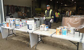 Hazardous waste being collected at a past hazardous waste collection event. - Bulletin File Photo