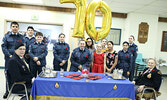 Members of 270 Otter Cadet Squadron served Remembrance Day Tea guests. Joining them at the serving table are Legion First Vice-President John Cole (seated left) and Legion Ladies Auxiliary member Peggy Stewart (seated right). - Tim Brody / Bulletin Photos