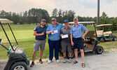 Men’s category first place winning team of Matt Monkman and Austen Hoey (on left), with second place winners Derek Green and Rob Martin (on right).      Sioux Lookout Golf and Curling Club / Submitted Photo