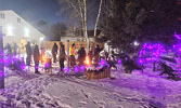 St. Andrew’s United Church Peace Garden was lit with the glow of many purple lights for the Nov 25th Shine the Light on Woman Abuse campaign event. The event coincided with the International Day for the Elimination of Violence Against Women.      Mike Law