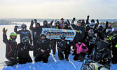  Riders for this years’ Sioux Lookout – Hudson, and Red Lake Snowarama for Easter Seals Kids pose with their banner during their stop at the top of Sioux Mountain. -  Michael Starratt / Submitted Photo