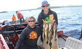 Steve Dumonski (left) and Matt Miller with the catch of the day.     Photo courtesy Sioux Lookout Walleye Weekend