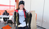 Jackie Toms holds up her Day 2 catch.  Tim Brody / Bulletin Photo