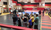 Warriors wrestling Coach Rob Sakamoto advices and encourages his squad. - Rob Sakamoto / Submitted Photo
