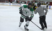 The Warriors battle the Muskies in boys hockey action on Feb. 8.   Tim Brody / Bulletin Photo