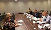 Sioux Lookout Mayor Doug Lawrance (left, background) and Chief Administrative Officer Michelle Larose (left, foreground) speaking with Ontario's Solicitor General Sylvia Jones (second from the right) during a delegation at the AMO Conference. - Image via 