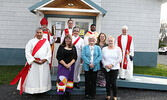 Back from left: Bishop Geoff Woodcroft, Reverend Canon Norman Collier, Venerable Naboth Manzongo and Reverend Diane Guilford. Middle from left: Reverend Deacon Muriel Anderson and Rikki Burke. Front from left: Reverend Deacon Bill Morris, Genevieve Kakeka