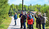 Merle and Edith Burkholder (second and third from the right) led groups along the Umfreville Trail and along Fanning Avenue trails during last year’s Sioux Lookout Bird Walk. - Jesse Bonello / Bulletin Photo