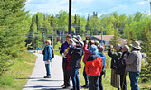 Merle and Edith Burkholder (second and third from the right) led groups along the Umfreville Trail and along Fanning Avenue trails during the Sioux Lookout Bird Walk. - Jesse Bonello / Bulletin Photo