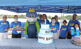 Blueberry Festival Committee members celebrate Blueberry Festival mascot Blueberry Bert’s birthday in 2020. The festival, and Bert, will turn 40 this year.   Bulletin File Photo