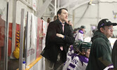 Bombers Head Coach Carson Johnstone (wearing tie) keeps a careful eye on the action.   Tim Brody / Bulletin Photo