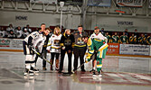 Sioux Lookout Mayor Doug Lawrance (centre) prepares to drop the puck to ceremonially open last Saturday evening’s exhibition game, hosted by the Sioux Lookout Bombers, between the Thunder Bay North Stars and the Dryden GM Ice Dogs at The Hanger (Sioux Loo