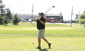 Jamie Wisnoski tracks his shot as it sails down the fairway.   Tim Brody / Bulletin Photo