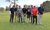 Golf tournament players at SLGCC’s Hole 13. From left: Todd MacDonald, Rob Martin, Luc Beaulne, Mitch Wills, Jamie Wisnoski, Dave Kulchyski, Moe Bouchard, and Alex Beaulne. 