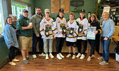Representatives from the Sioux Lookout Bombers and the Hub Collective at the launch of “Bombers Brew”. Pictured from left: Ashley Cassidy - Billet Coordinator (and daughter Teal), Jame Brohm - Bombers Director of Marketing and Communications, Joe Cassidy 