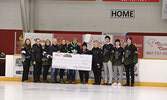 Representatives from the Sioux Lookout Bombers, Rotary Club of Sioux Lookout, and Sioux Lookout First Nations Health Authority present a cheque for $2,000 to the Meno Ya Win Health Centre Foundation.  From left: Bombers Director Liz Hurlen, SLMHC Foundati