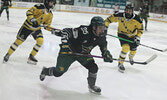 The Sioux Lookout Bombers, wearing special jerseys for the evening, defeated the visiting Red Lake Miners 4-1 on Feb. 24.     Tim Brody / Bulletin Photo