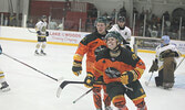 Bombers Forward Reed Scaddan (foreground) celebrates his first period goal. Tim Brody / Bulletin Photo