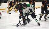 Damon Angees (19) battles for a faceoff during game two of the NorWOSSA finals against the Fort Frances Muskies. - Jesse Bonello / Bulletin Photo