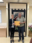 Lac Seul First Nation Chief Clifford Bull (right) hand delivers The Bringing Our Children Home Proposal to Christiane Fox, Deputy Minister, Indigenous Services Canada.     Lac Seul First Nation / Submitted Photo