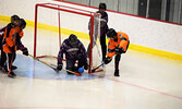 The Mishkeegogamang Warriors look for a wrap-around goal against the Mishkeegogamang Stormfront. - Jesse Bonello / Bulletin Photo