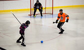 Mishkeegogamang Stormfront looks to blast a shot past the Mishkeegogamang Warriors. - Jesse Bonello / Bulletin Photo