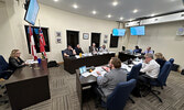 Municipal Treasurer Carly Collins (left) takes Council through the first draft of the 2023 Budget.   Tim Brody / Bulletin Photo