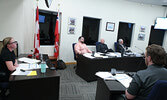 Municipal Treasurer Carly Collins (seated far left) walks Council through the 2024 Budget.   Tim Brody / Bulletin Photo