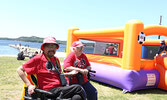 Garnet Angeconeb and wife Margaret Angeconeb take in the Canada Day celebrations at the town beach. - Tim Brody / Bulletin Photos