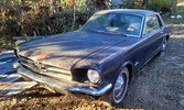 This 1965 Mustang sat in a shed for years before being brought home by Andrew Wallace. It’s a restoration project that Wallace is excited to begin.      Mike Lawrence/Bulletin Photos