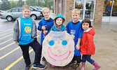 Children promote Smile Cookie sales to support Cedar Bay at Tim Hortons in 2017. - Nancy McCord / Submitted Photo