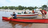 Participants prepare to set out on their paddle around Equay-Minis Island.   Tim Brody / Bulletin Photo
