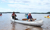 Lac Seul First Nation Chief Clifford Bull (seated rear of canoe) and Sioux Lookout Mayor Doug Lawrance (seated front of canoe) prepare to set out.   Tim Brody / Bulletin Photo
