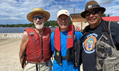 From left: Sioux Lookout resident George Hoggarth, Sioux Lookout Mayor Doug Lawrance, and Lac Seul First Nation Chief Clifford Bull at the celebration of Equay-Minis Island.    Tim Brody / Bulletin Photo