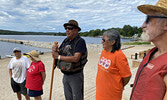 Lac Seul First Nation Chief Clifford Bull (third from left) shares his thoughts on the renaming of the Island.   Tim Brody / Bulletin Photo