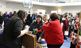 Visitors to the 2019 Christmas Arts and Craft Fair browse the wares of participating vendors.      Bulletin File Photo