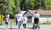 Pride flags, stickers, face tattoos, and colourful shirts were on display during the colour run. - Jesse Bonello / Bulletin Photos