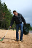 Karl Friesen cleans up along the shores of a local beach.  Bulletin File Photo 