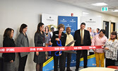 Confederation College President Kathleen Lynch (middle), alongside Confederation College staff and community partners, concluded the grand opening of the new Sioux Lookout Campus with a ribbon cutting ceremony. - Jesse Bonello / Bulletin Photo