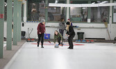 JoAnne Van Horne delivers a stone down the ice during the Draw to the Button event.  Tim Brody / Bulletin Photo