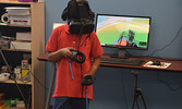 Participants had the opportunity to use a Virtual Reality drawing program called Tilt Brush. It allows users to sculpt and make 3D creations while using Virtual Reality technology. - Jesse Bonello / Bulletin Photo