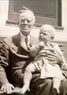 Nan’s 100-year-old grandfather George C. Hield holding her baby, John Ernest Albrecht, 1951.     Photo courtesy Rabeeh Shhadeh     