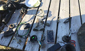  Just a few of the many items recovered from Love’s Cove during a recent scuba dive that led to the recovery a local resident’s lost wallet.     Submitted Photo