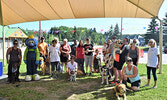 This year’s participants, accompanied by their furry friends, at the Sioux Looks Out For Paws Rescue Walk on August 3. - Jesse Bonello / Bulletin Photo