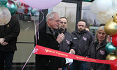 Sioux Lookout Mayor Doug Lawrance (left) offers congratulations on the opening of Your Dollar Store With More.   Tim Brody / Bulletin Photo