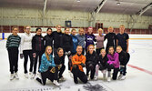 Elvis Stojko (bottom row, middle) with a group of older skaters, who skate in Star 5 and up, during the seminar. - Jesse Bonello / Bulletin Photo