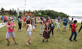 Family dance participants move to the music.   Tim Brody / Bulletin Photo